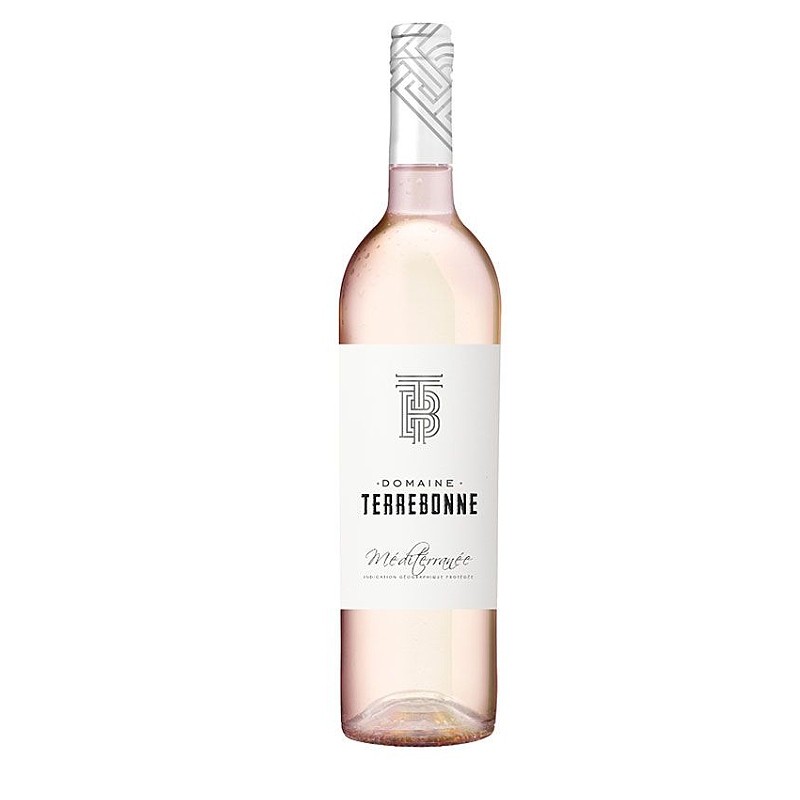 Bouteille de vin Domaine Terrebonne Méditerranée rosé au style provençal, robe pâle et arômes fruités